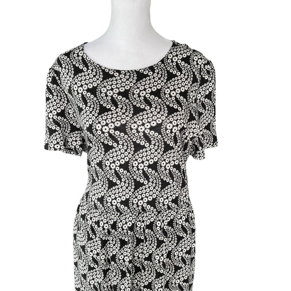 Boden - Tiered Easy Jersey Midi Dress
Black Daisy Swirl Sz 10 - Picture 5 of 9